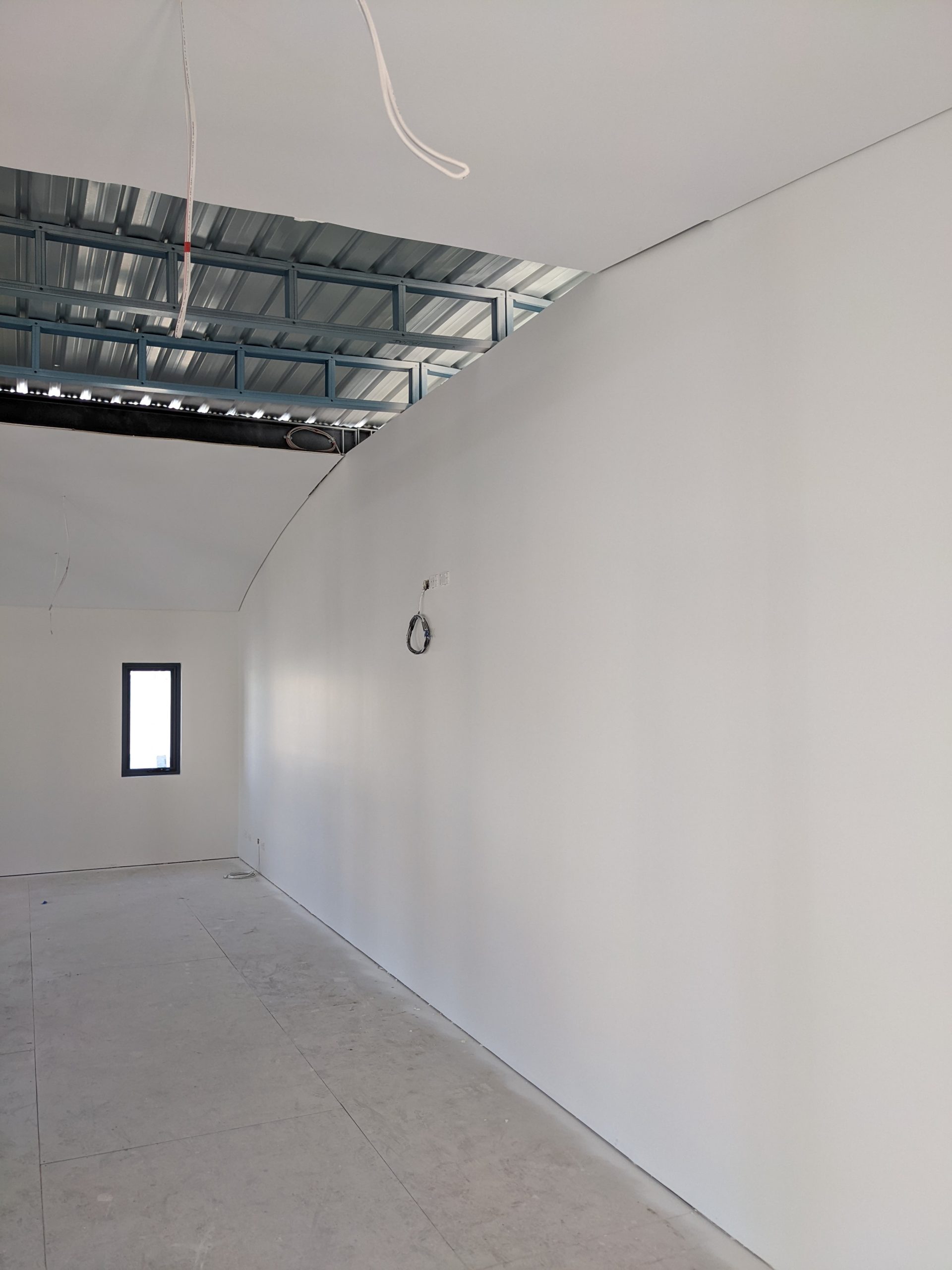 The curved ceiling of a prefabricated classroom module
